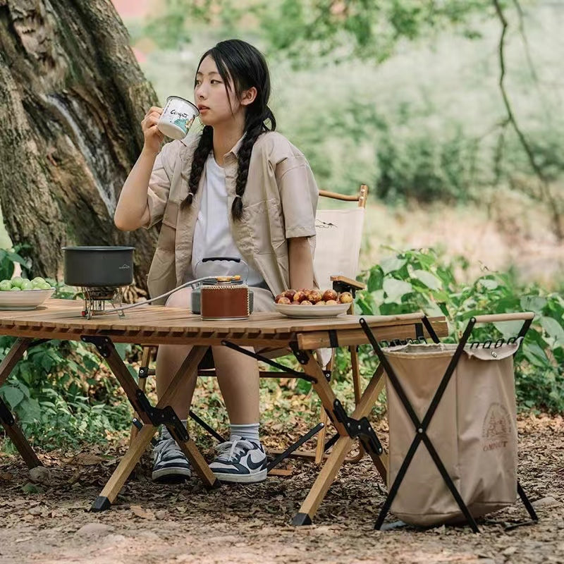 "Compact Folding Trash Bin for Eco-Friendly Campsites"